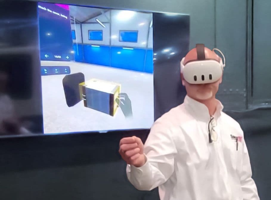 “man wearing VR glasses demonstrating walkaround inspection lesson”